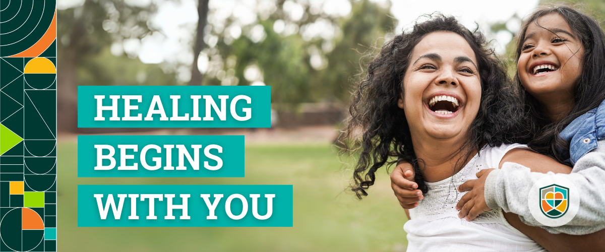 Woman and child smiling with text reading "Healing begins with you"