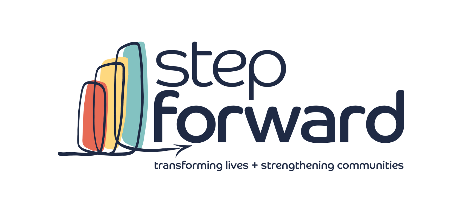 Head Start children stand smiling.